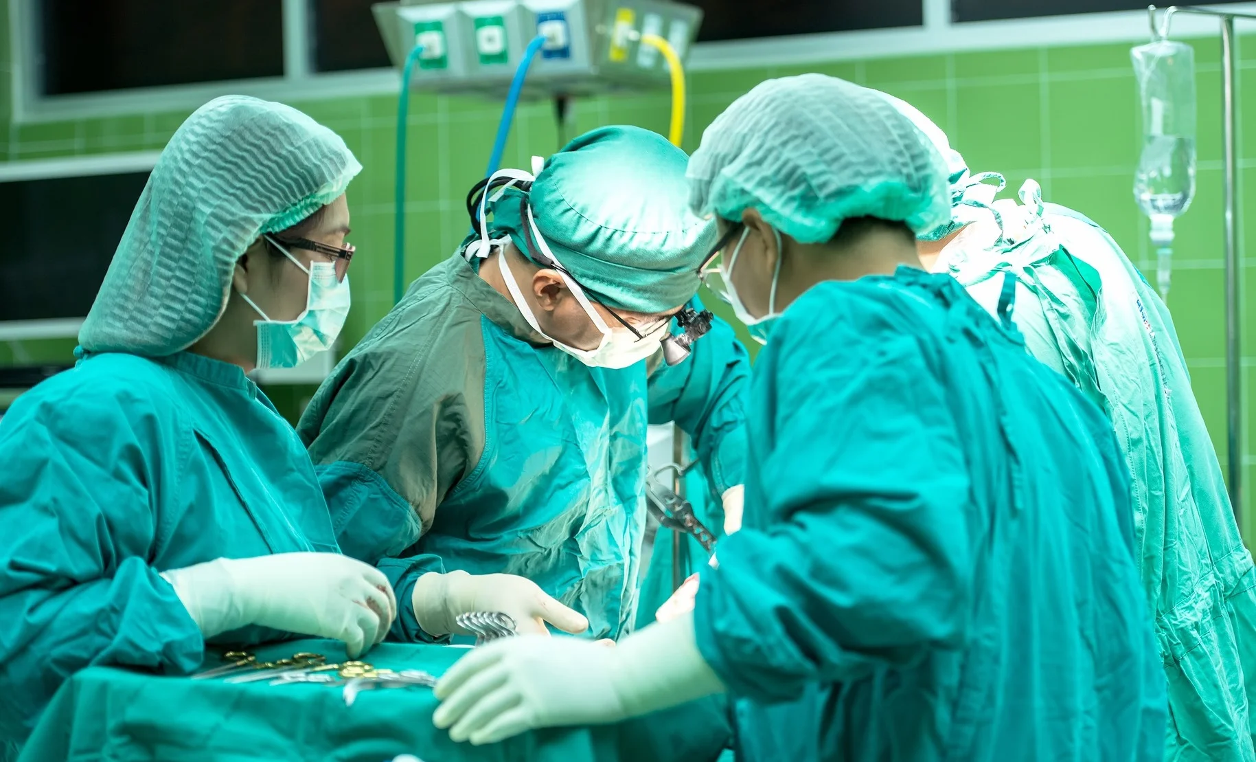 AMEN volunteers treating a patient